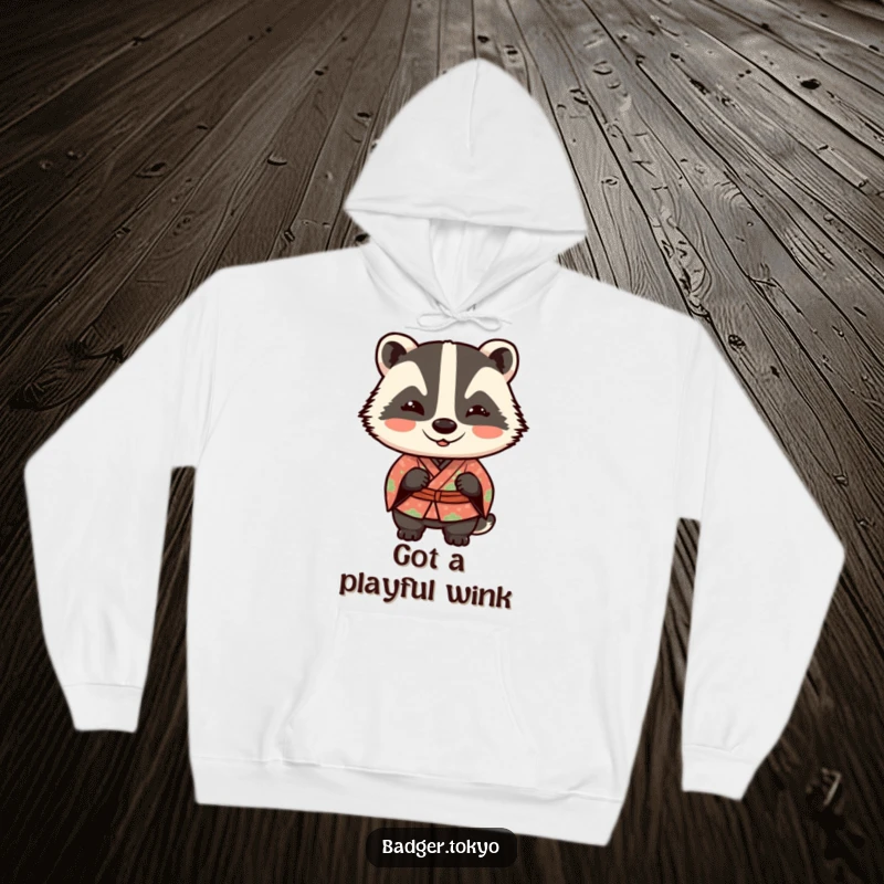 Funny Kawaii badger in a patterned kimono giving a playful wink, a cozy and humorous hoodie design.