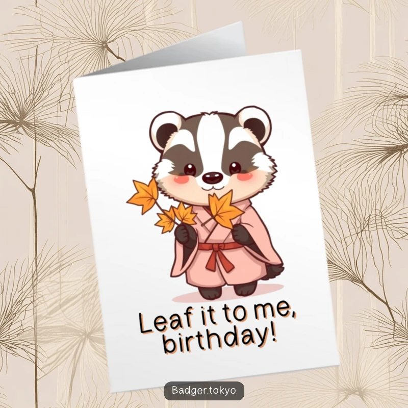 Funny Free Printable Birthday Card featuring a badger in a simple kimono, thoughtfully holding a delicate maple leaf, ready to wish 'Happy Birthday'.